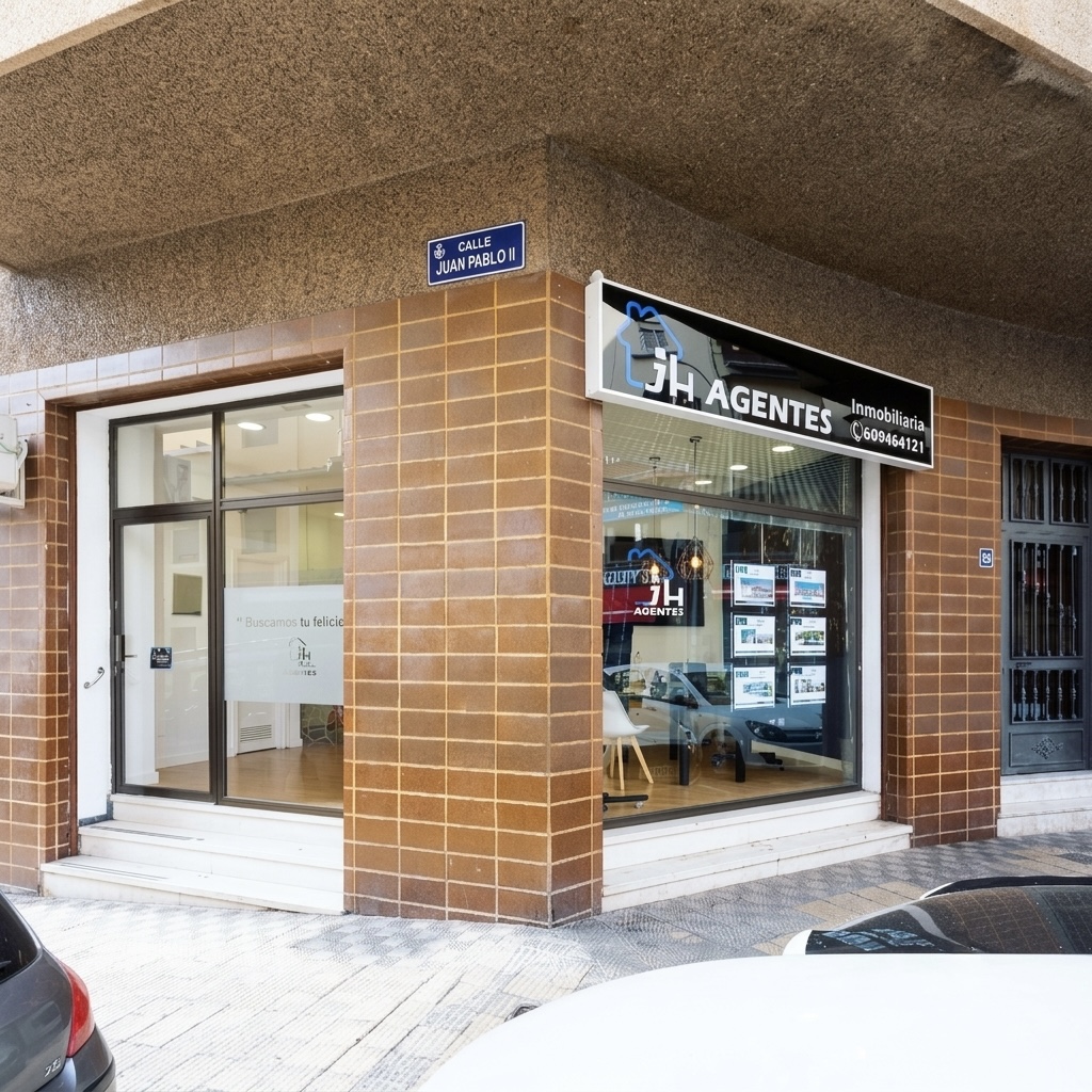 Fachada de JH Agentes en la calle Juan Pablo II